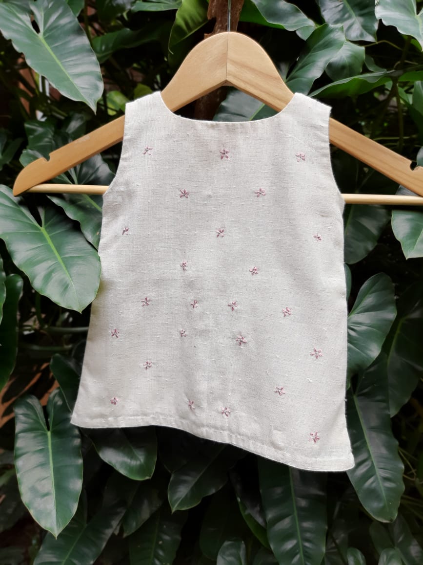 A Line Dress - Size 14 (06-12 months) Cotton ‘Dobby’ fabric detailed with hand embroidered flowers