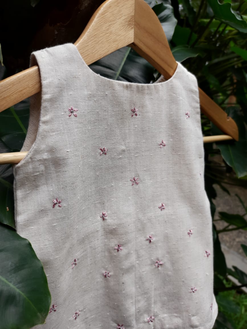 A Line Dress - Size 14 (06-12 months) Cotton ‘Dobby’ fabric detailed with hand embroidered flowers